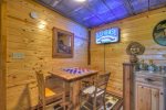 Lower Level Den with a Flat Screen TV, Gas-Log Fireplace and a Wet Bar with a Mini Fridge